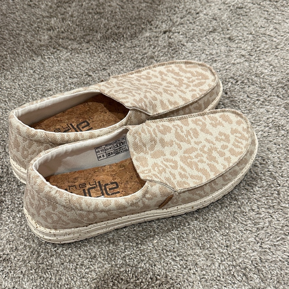 HeyDudes Tan leopard Slip-On Shoes, size 10